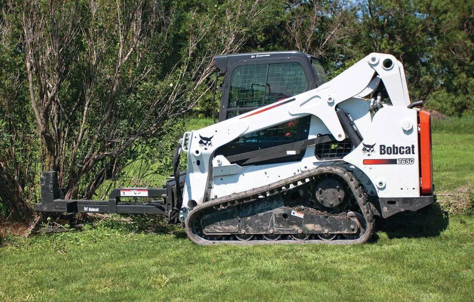 Гидромолот bobcat. Мини-погрузчик Bobcat t650. Бобкэт погрузчик t650. Гусеничный мини погрузчик Bobcat t650. Бобкэт 650.