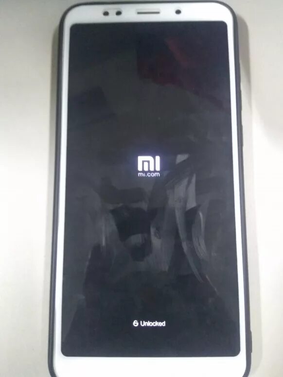 Телефон xiaomi не загружается. Xiaomi Unlocked. Xiaomi надпись Unlocked. Mi Unlock Xiaomi. Mi Unlocked при включении.