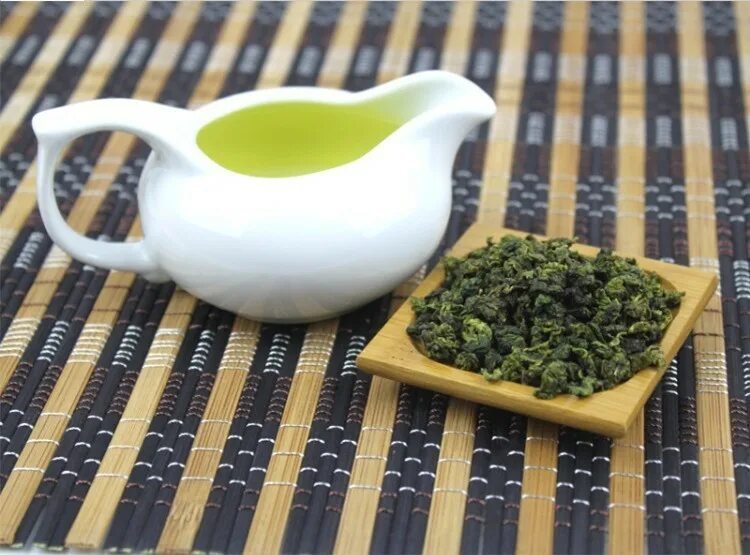 чай "те гуань инь ". улун те гуань инь чай. чай зеленый те гуань инь. зеленый китайский чай те гуань инь. чай зеленый те гуань инь.