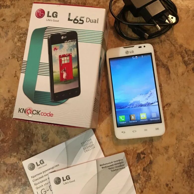 LG l65 Dual. Смартфон LG коробка. LG c2 коробка. 65l09 отзывы.