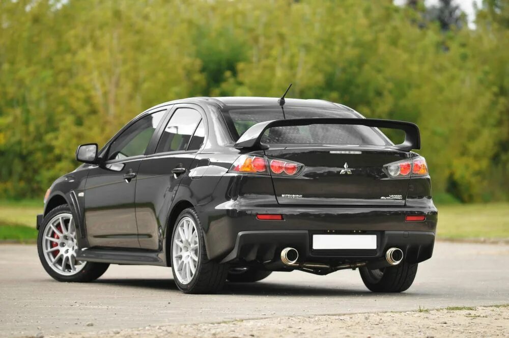 Mitsubishi lancer 10 поколения. Mitsubishi Lancer 11. Лансер Эволюшн 11. Mitsubishi Лансер 11. Митсубиси Лансер Эволюшн 2021.