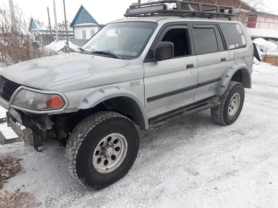 Расширители арок митсубиси паджеро спорт 1. Mitsubishi pajero sport 1 расширители арок. Расширители арок монтеро спорт. Арки монтеро спорт. Расширители арок pajero sport 2.