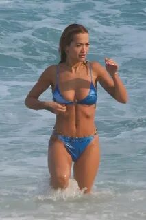 RITA ORA in Bikini at a Beach in Rio De Janeiro 09/12/2022.
