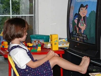 Children watch cartoons