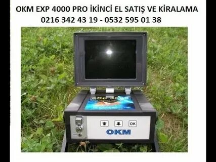 Окм