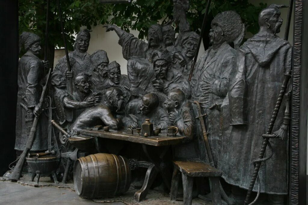 Памятник запорожцам в краснодаре. Краснодар запорожцы. Памятник запорожцам в краснодаре. Скульптура запорожские казаки краснодар. Запорожцы пишут письмо турецкому султану памятник краснодар.