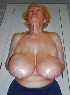 Huge hanging tits on older lady.