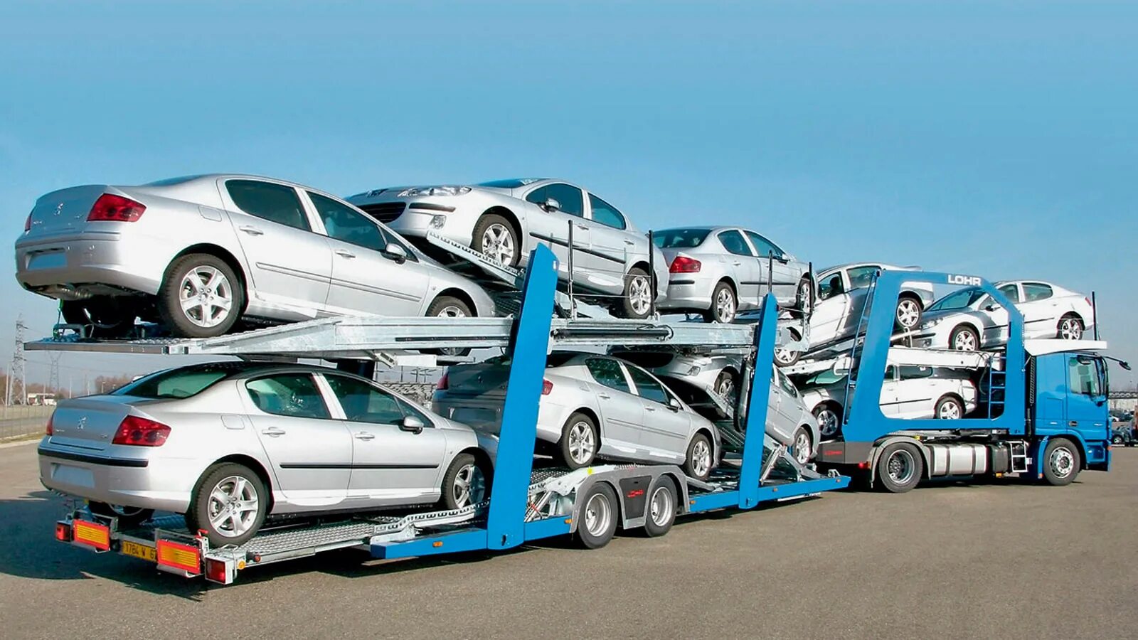 Параллельный импорт авто с 1 апреля 2025. Автовоз. машина автовоз. параллельный импорт автомобилей. авто на автовозе.