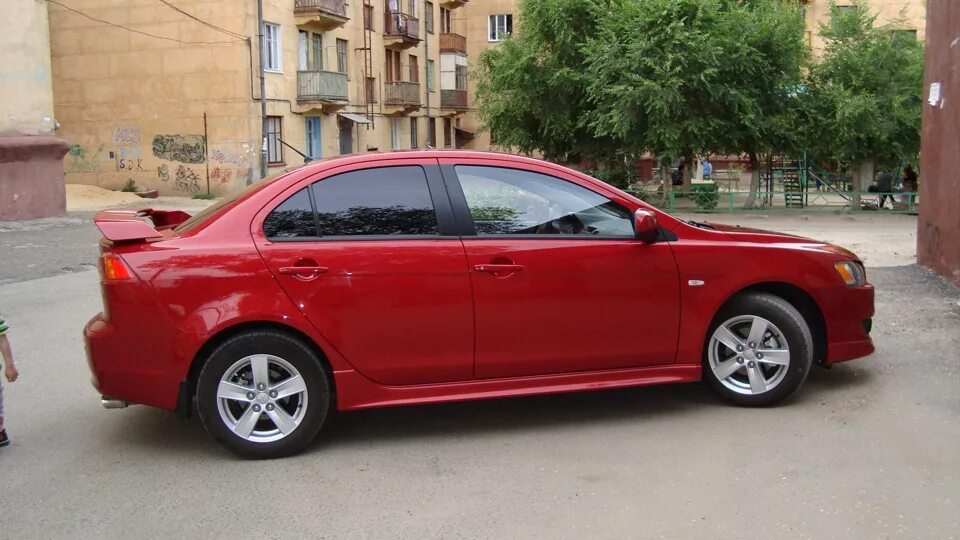 Lancer 10 2007. Митсубиси Лансер 10 красный. Mitsubishi Lancer красный 2007. Лансер 10 красный. Mitsubishi Lancer x красный металлик.