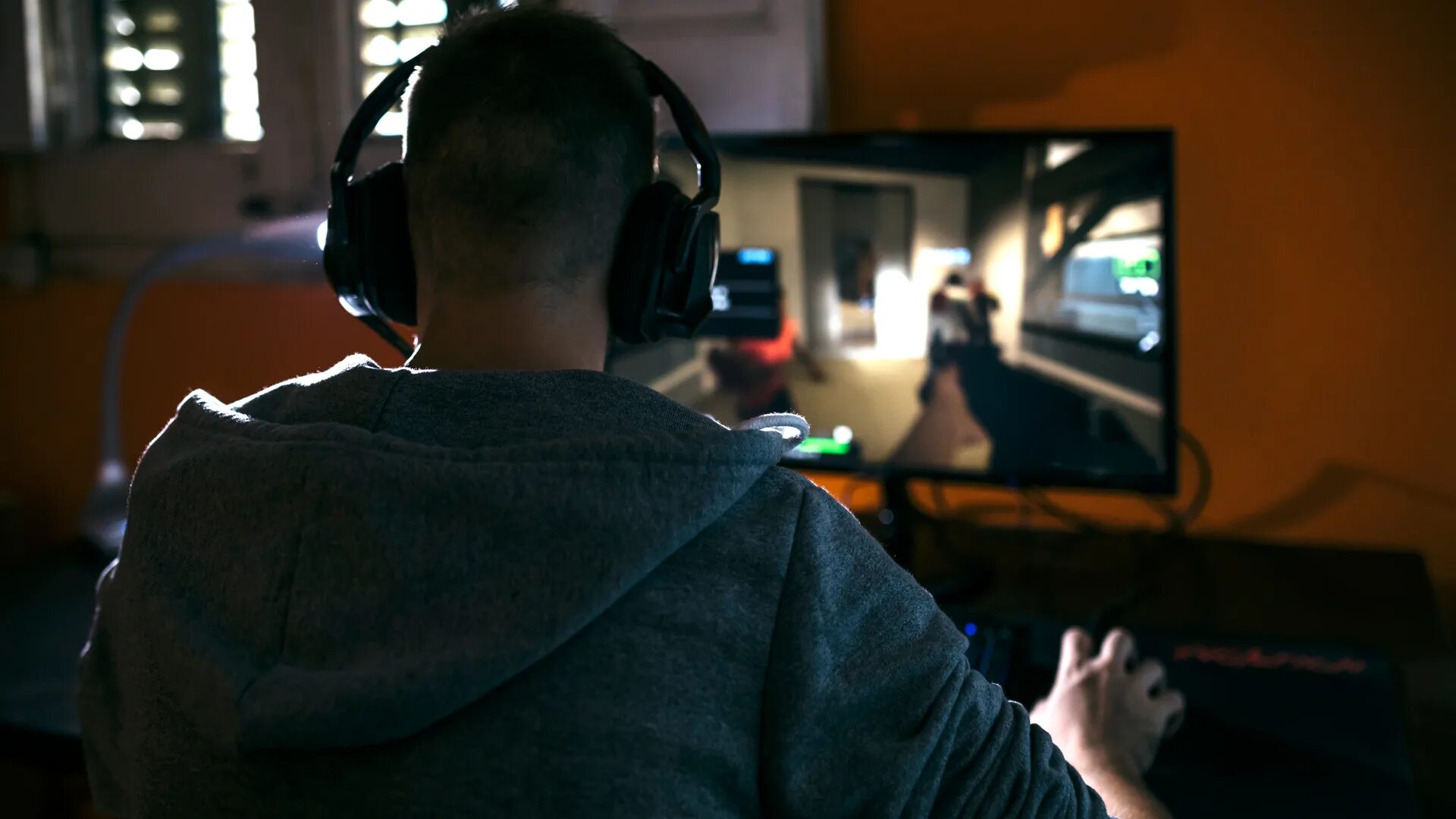Nick playing computer games the