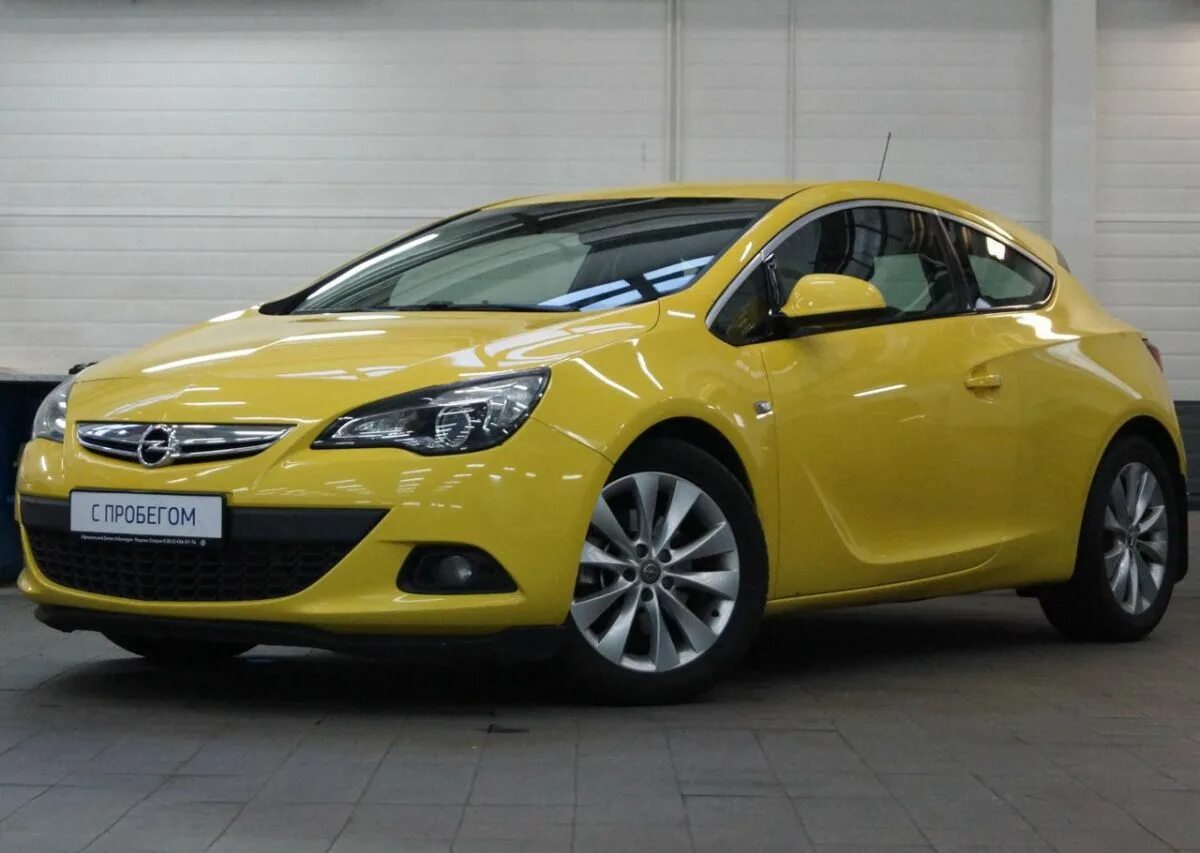 Автомобили опель с пробегом. Opel GTC 2012 желтый.