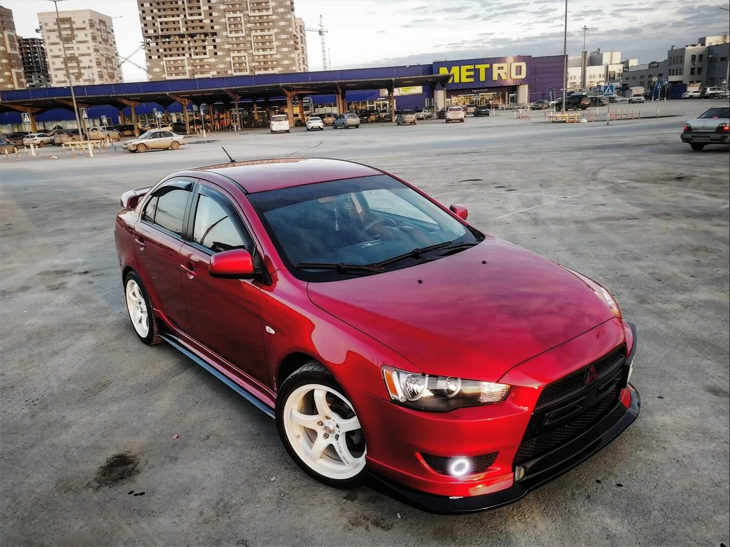 Mitsubishi lancer отзывы. Мицубиси Лансер 10. Лансер 10 GTS. Лансер 10 вишневый. Mitsubishi Lancer 10 2.0.