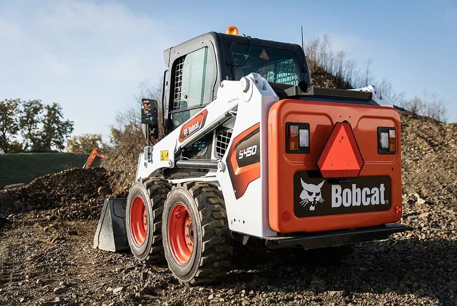 Bobcat s250. Бобкэт s450. Мини погрузчик Бобкэт. Bobcat s530. Бобкэт 250.