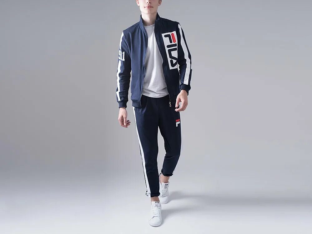 Фила спортивная. Спортивный костюм fila. Спортивки fila мужские. Спортивный костюм женский fila мода 2022. Костюм fila женский.