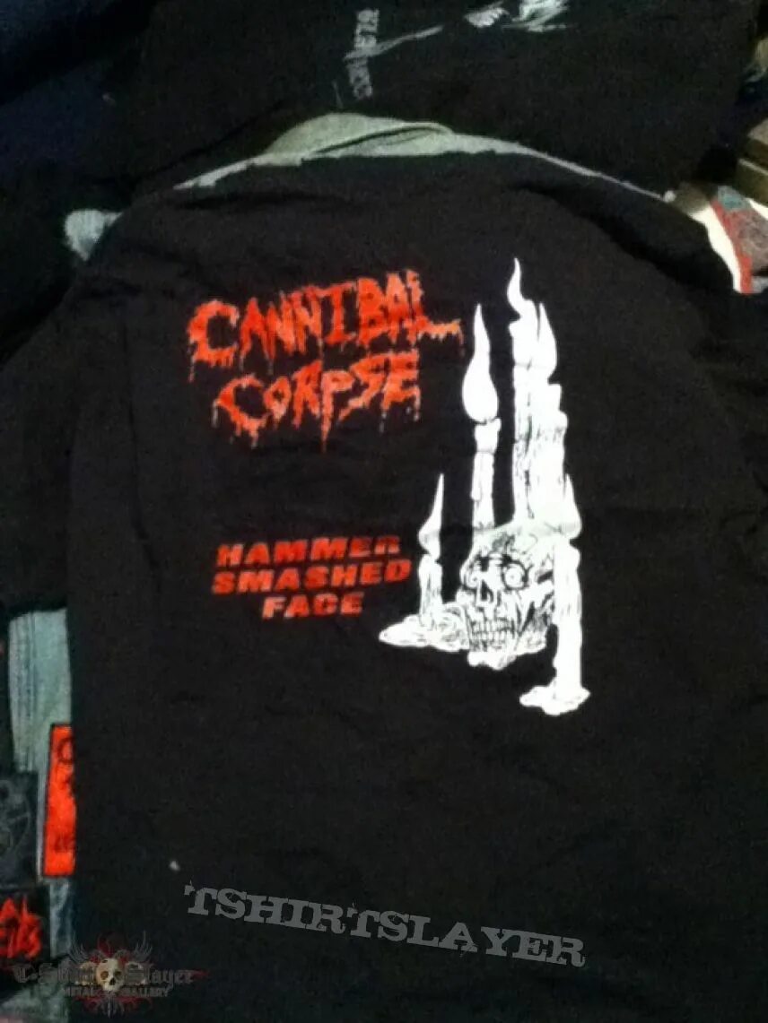 Cannibal corpse hammer. Cannibal Corpse Tomb of the Mutilated обложка. Cannibal Corpse Hammer smashed face album.