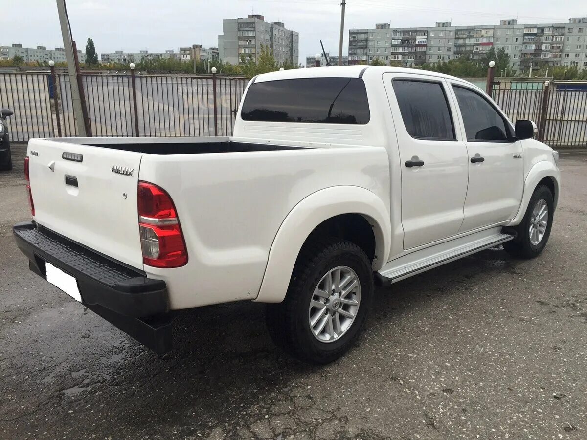 Купить пикап в свердловской области. Тойота Хайлюкс пикап 2011. Toyota Hilux 2015 белый. Toyota Hilux 2014. Тойота Хайлюкс пикап 2011 белый.