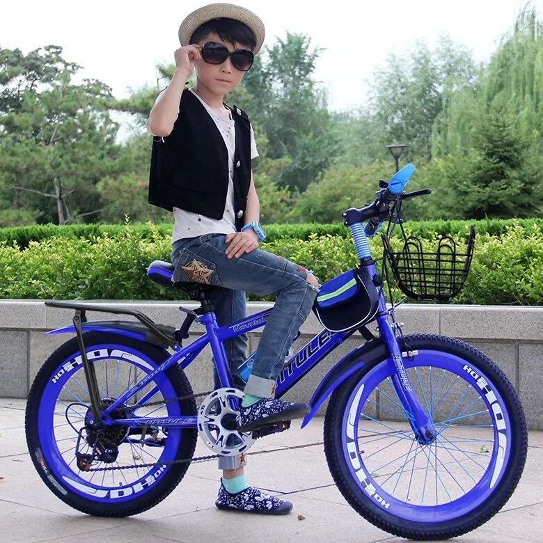 Какой велосипед купить ребенку 7. Stels Talisman 14 синий. Велосипед на рост 110 для мальчика. Мальчик на велосипеде. Велосипед для ребенка 7 лет.