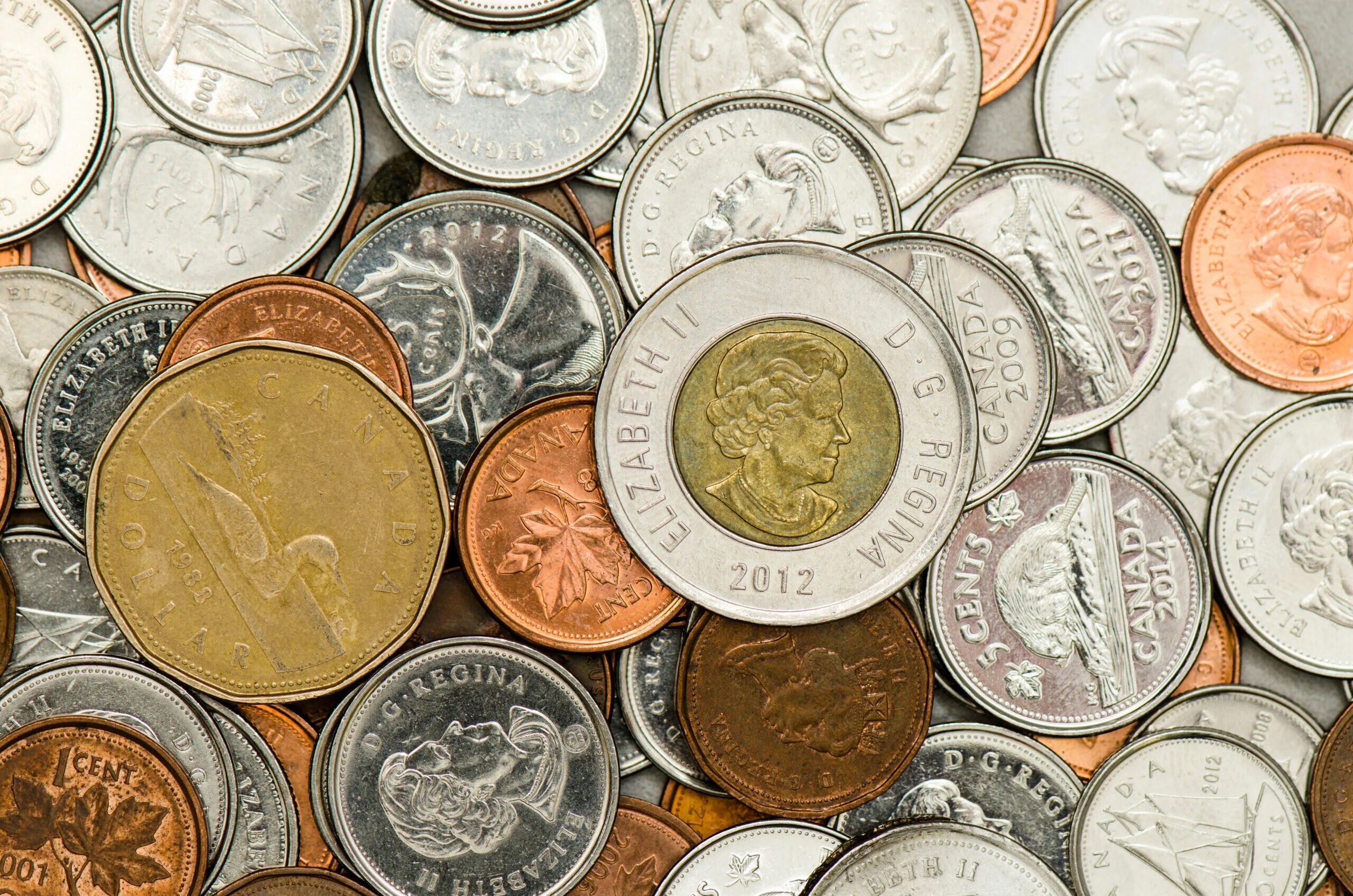 0 currencies. Канадские деньги монеты. Мелочь. Канадские монеты современные. Валюты Канады монетами.