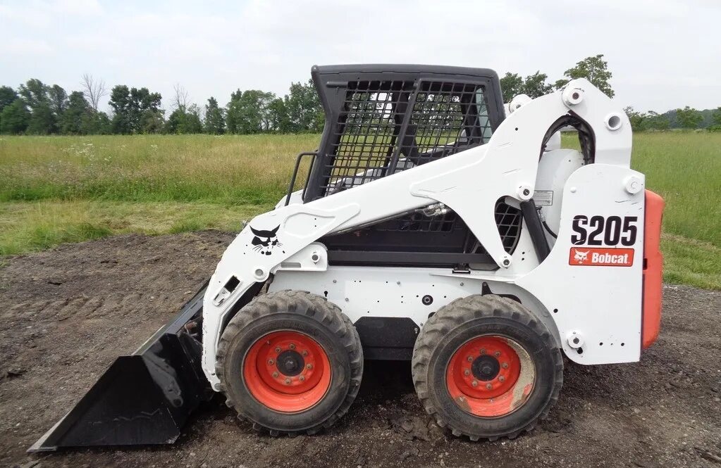 Бобкэт 205. Bobcat s530. Погрузчик s205. Мини погрузчик Бобкэт. Фреза на бобкэт