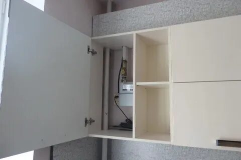 Закрыть трубы шкафом на кухне