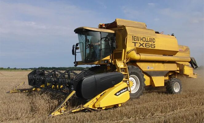 New holland масла. Зерноуборочный комбайн Нью Холланд. Комбайн Нью Холланд 6070. Комбайн Нью Холланд CR 8070. Комбайн Нью Холланд CSX 7080.