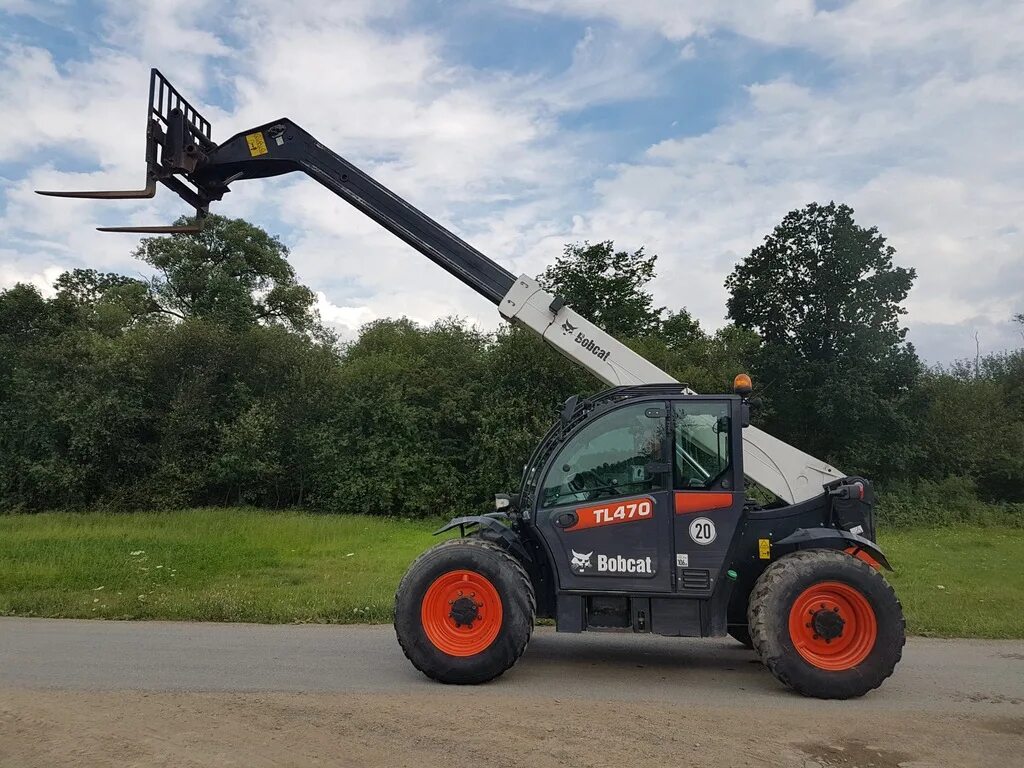 Стекло бобкэт. Погрузчик bobcat tl360. Bobcat tl30. Бобкэт телескопический. Погрузчик bobcat tl360.
