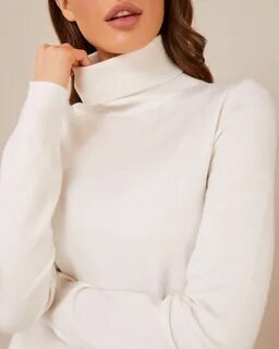 Turtleneck in milk shade.