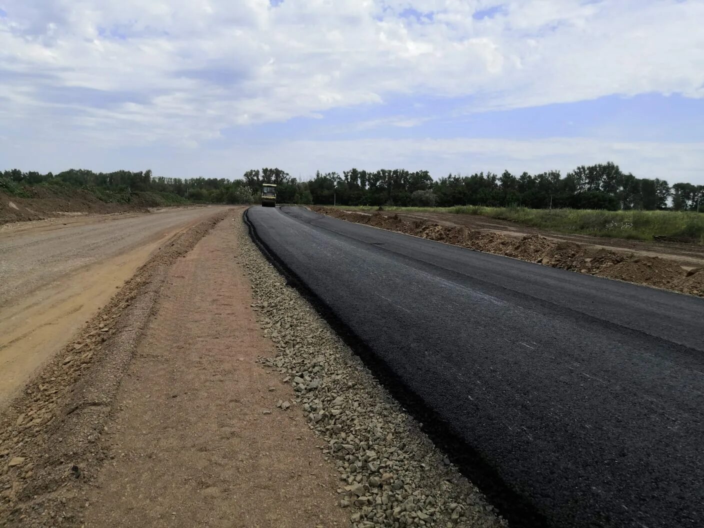 Новая дорога. Дорога в поселке. Строительство дороги. Дороги Сакмарского района.