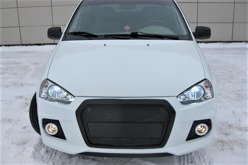 Передний бампер лада калина 1 лика 2. Лада калина с бампером от приоры 2. Бампер от калины 2 на калину 1. Бампер от приоры на калину 1. Лада калина 1 бампер рестайлинг.