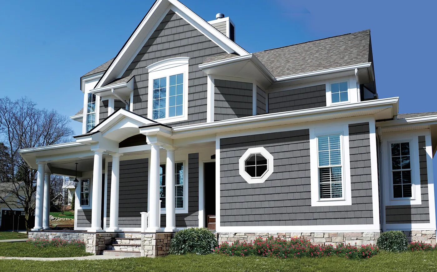 Облицовка белого дома. Облицовка белого дома. Дагестанский камень белый известняк. Фасад дома в американском стиле. Отделка фасада известняком.