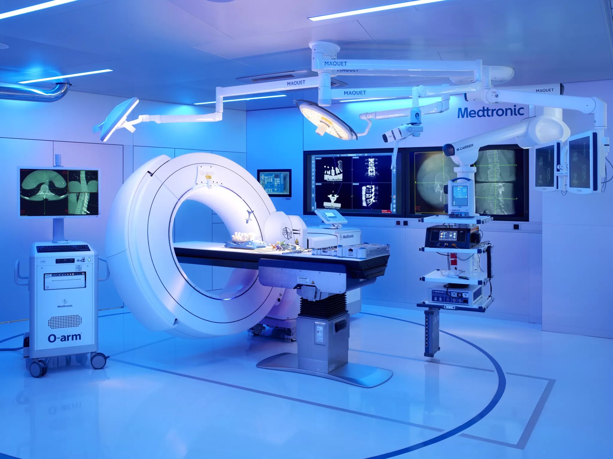 Фирма медицинское оборудование. Medtronic o-arm томограф. maquet magnus. мрт оборудование. современные операционные.