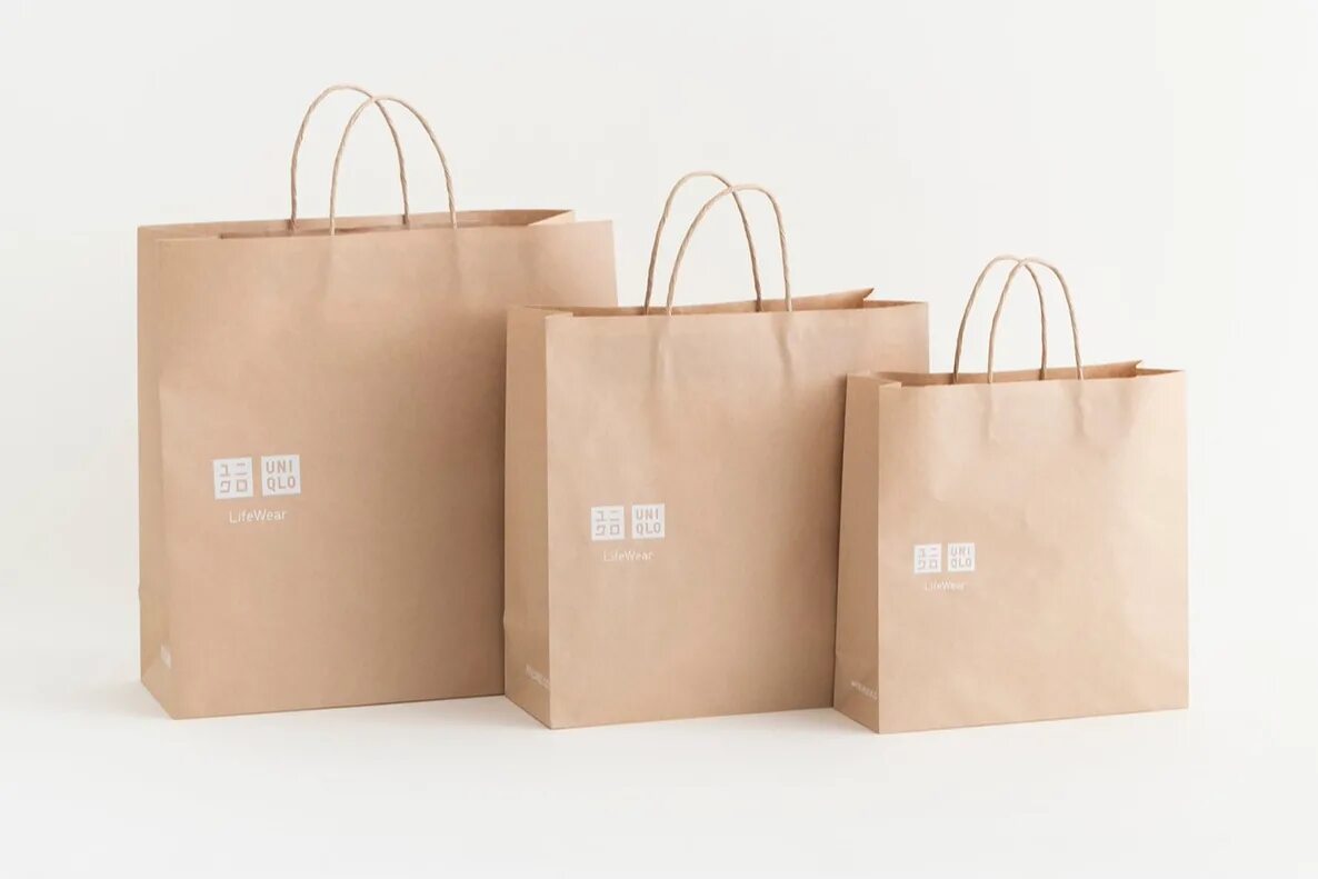 Бумажные пакеты работа. Пакет юникло. упаковка uniqlo. пакет бумажный. пакеты для упаковки.