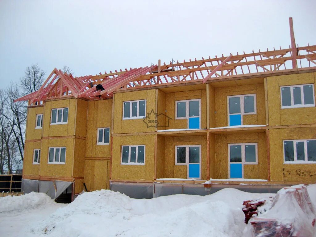 Puukuokka housing block. Трехэтажный дом из сип панелей. Щитовые многоквартирные дома. Сип панели для многоквартирных домов. Многоэтажные каркасные здания.