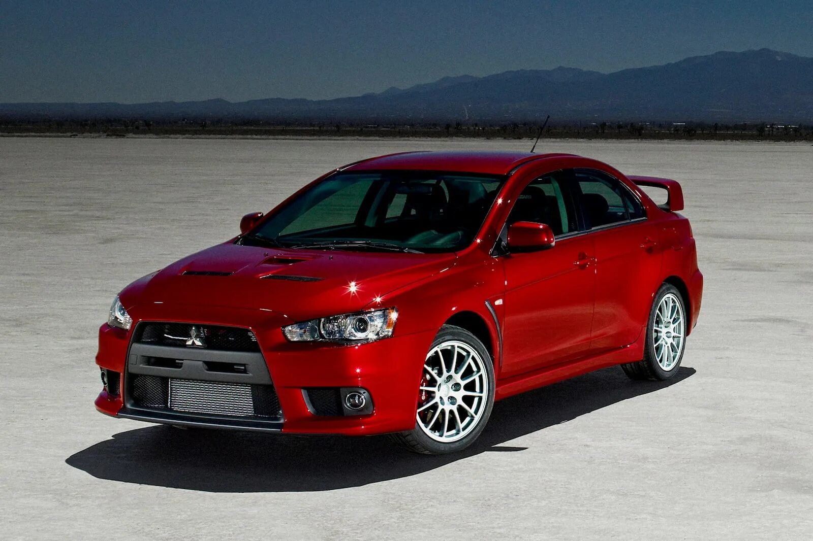 Mitsubishi lancer 10 поколения. Митсубиси Лансер Эволюшн 2008. Митсубиси Лансер 10. Митсубиси Лансер Эволюшн 1. Мицубиси Лансер 2008.