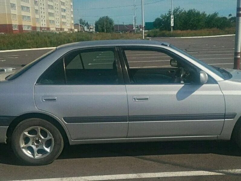 1997 года архив. Toyota Carina t210 1997. Toyota Carina 210 1997. Toyota Carina 7 поколение.