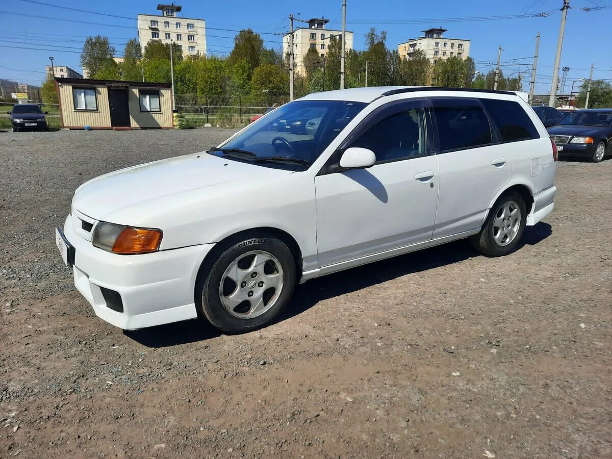 Nissan wingroad 2000 года. Ниссан Wingroad 2000. Вингроуд 2000 Ниссан белый дорестайл. Ниссан Вингроад 3. Nissan Wingroad седан.