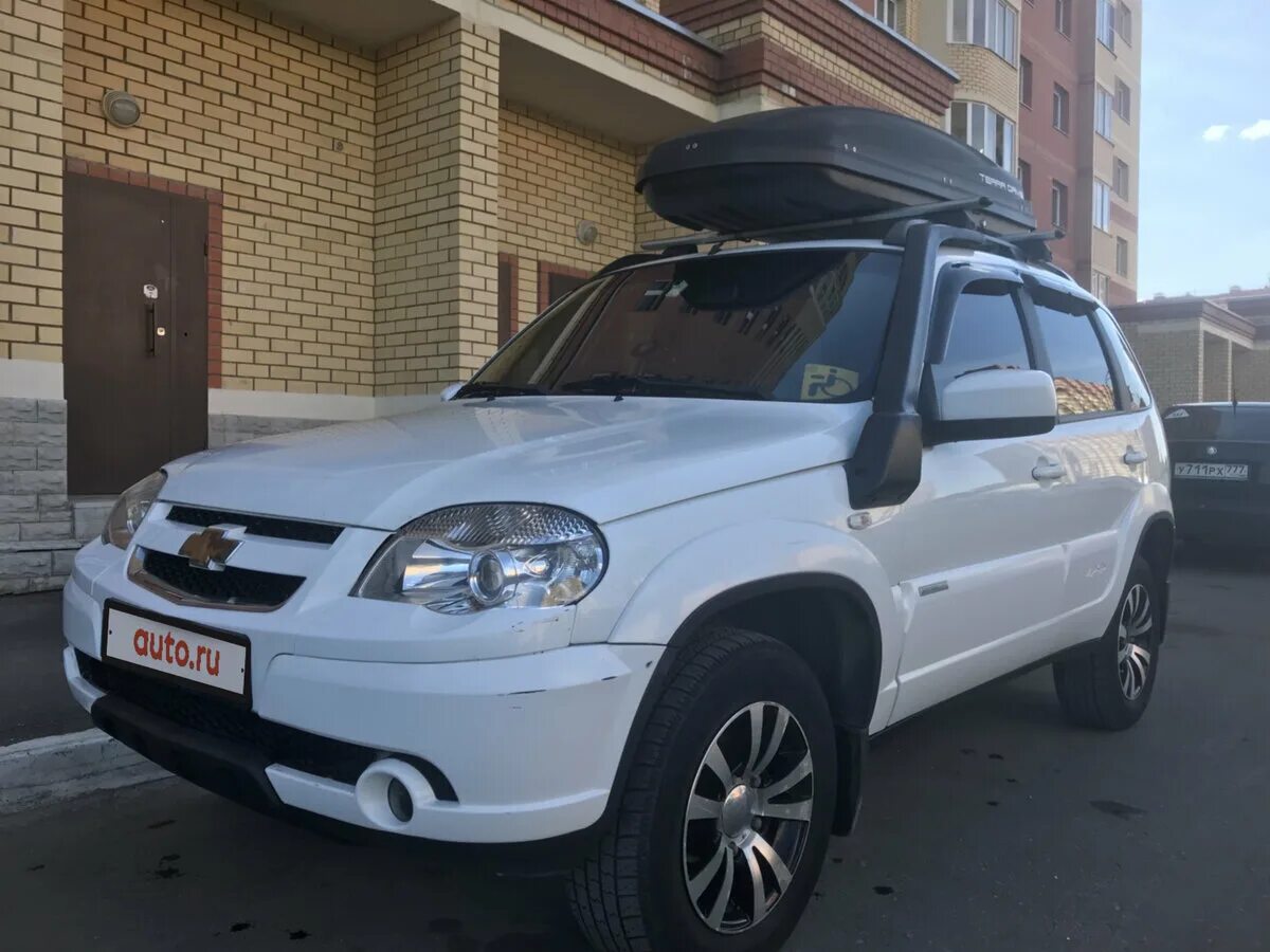 Купить шевроле нива нижегородская область авито. Нива Шевроле 2013. Chevrolet Niva 2013. Шевроле Нива Рестайлинг 2013. Шевроле Нива 2013 белая.