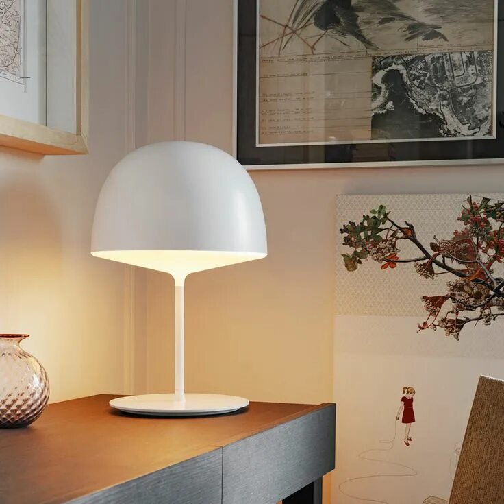 The lamp is in the table