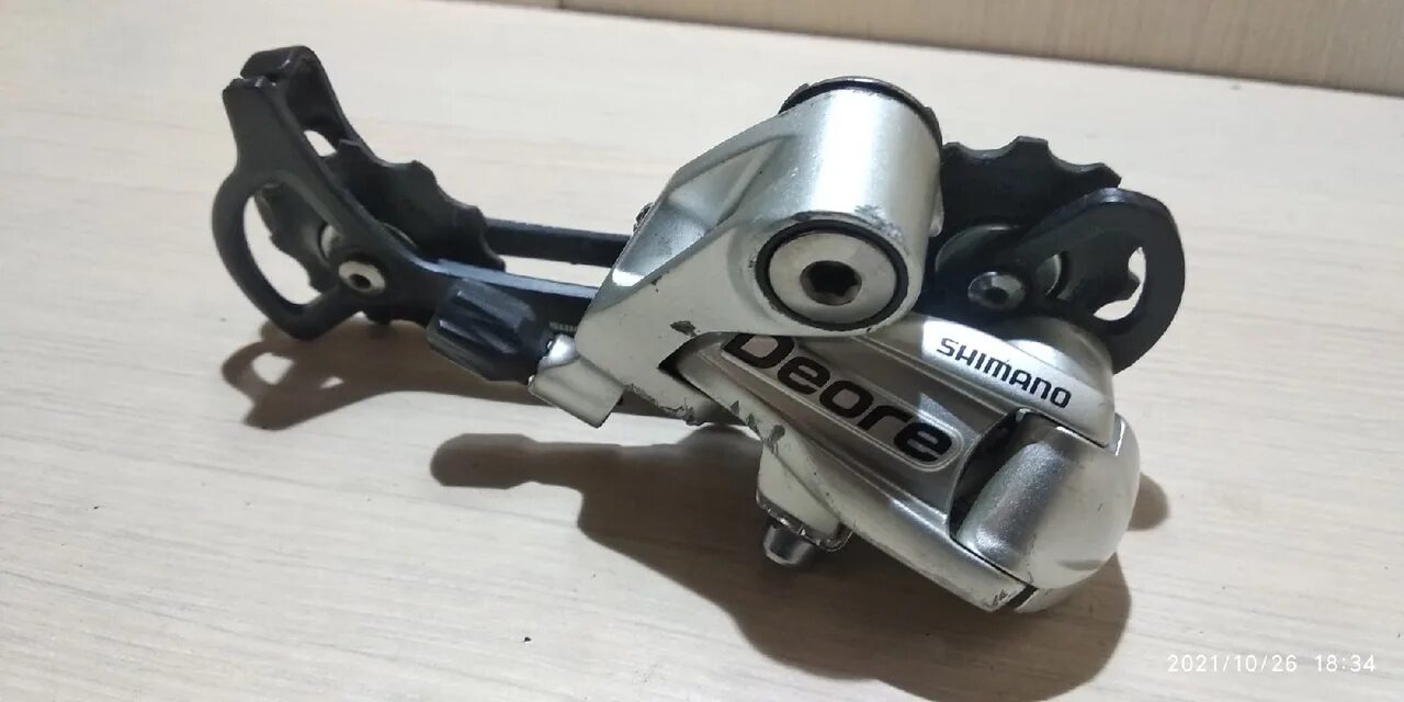 Задний переключатель shimano deore 9. Shimano deore rd. shimano deore rd-m5120. задний переключатель shimano deore. shimano deore rd-m511.