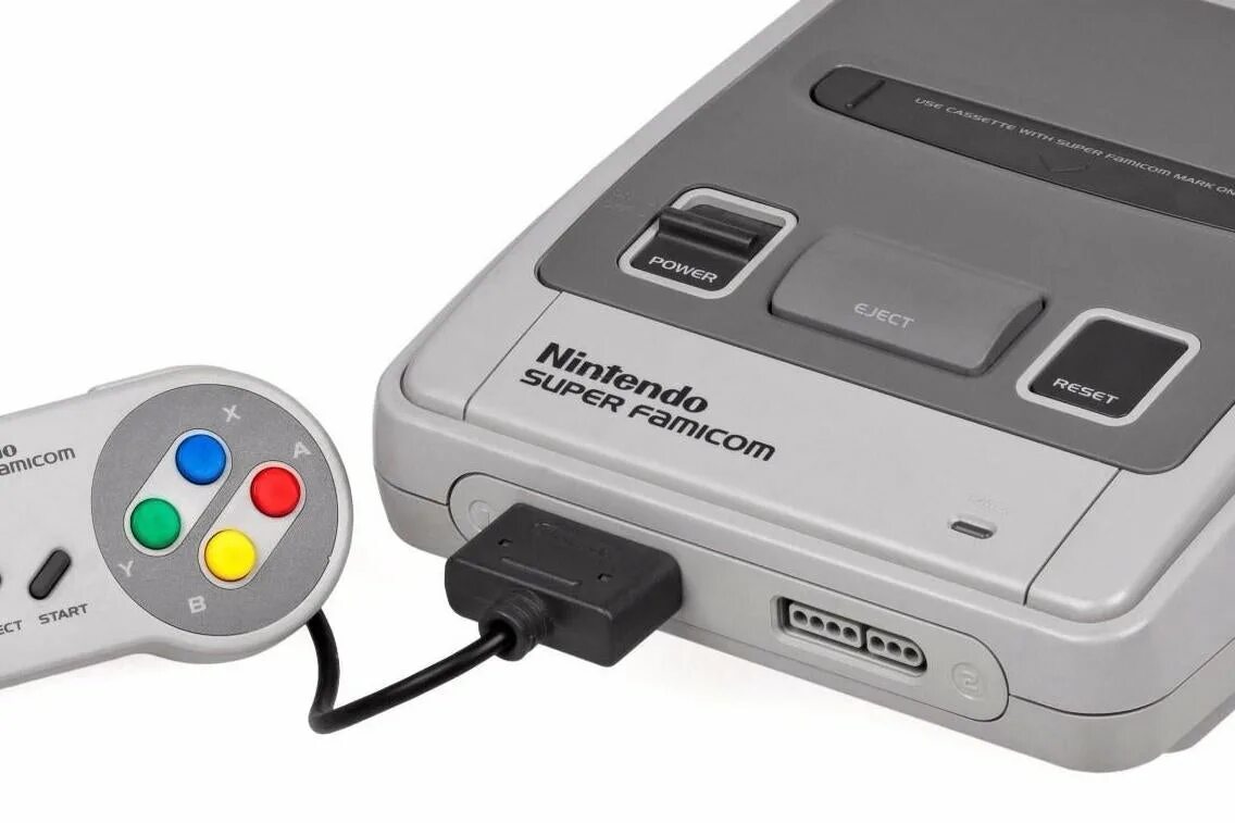 Super snes. Приставка nintendo entertainment system. nes snes приставка портативная. нинтендо 1990.
