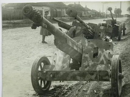 Орудием 7