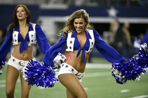 The Dallas Cowboys Cheerleaders perform in the first half of an NFL.