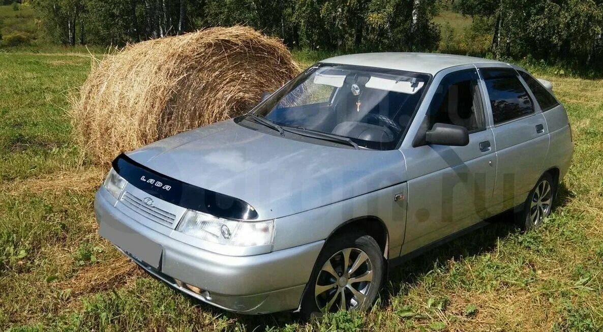 ваз 2112 в автосалоне. ваз 2110 2008. лада 2112 серебристая. лада 2112 тонированная. ваз 2112 хэтчбек серебристый.