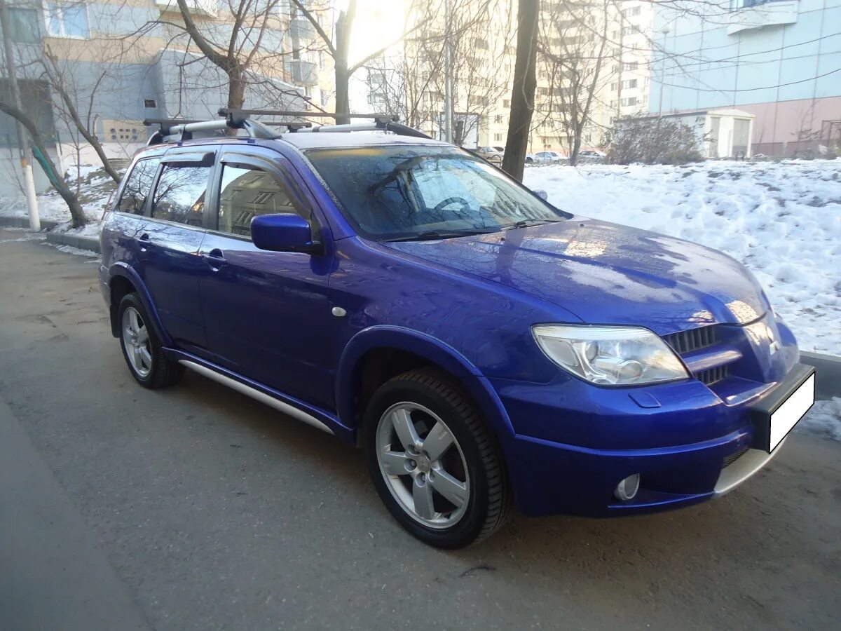 1 к 2007 г. Mitsubishi Outlander, 2007 синий. Аутлендер Митсубиси 2007 синий. Митсубиси Аутлендер 2007 2.4 автомат. Митсубиси Аутлендер 1 2007.