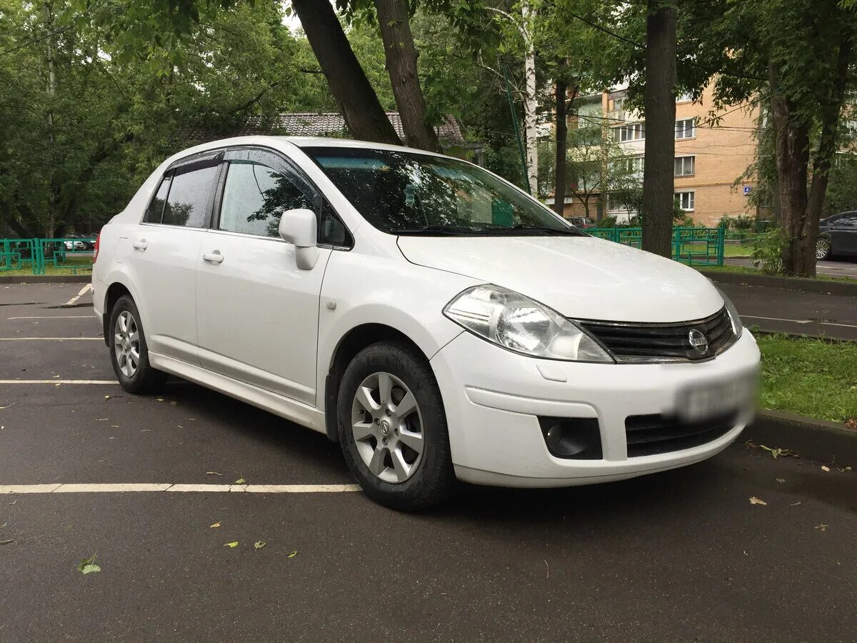 Ниссан тиида 2012 год. Nissan Tiida 2012 седан. Nissan Tiida i Рестайлинг, 2012. Ниссан Тиида белый. Ниссан Тиида белая седан.