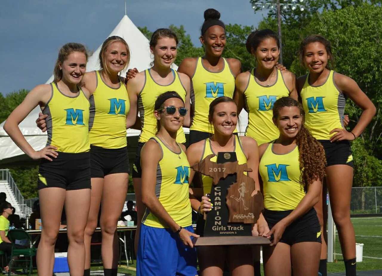 Track Team. School girls track Team. High School track. Tracking girl