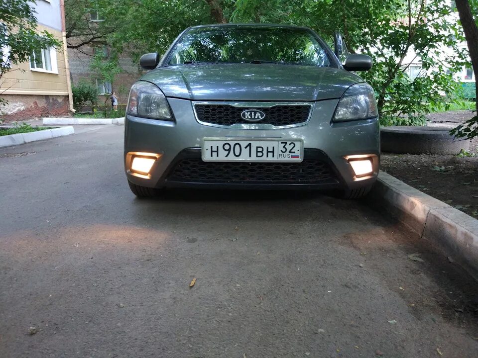 Kia rio противотуманные фары. Kia Rio 2010 лампочки ПТФ. Туманки Kia Rio 2. Kia Rio 2010 года противотуманки. ПТФ Киа Рио 2.