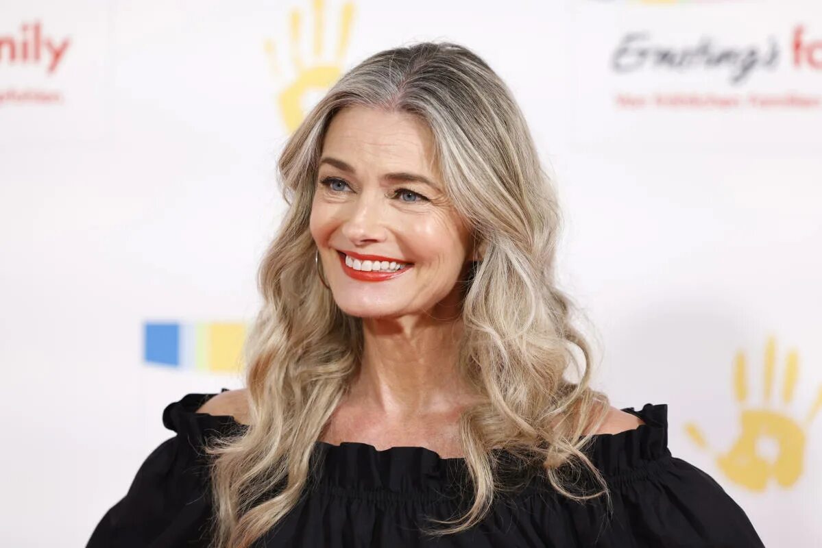 Paulina Porizkova, 57, strikes a playful pose in a hot pink bikini in Costa Rica
