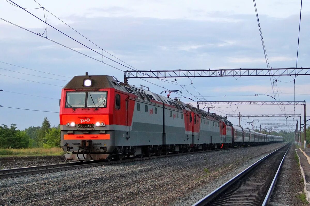 Укажите расчетную скорость электровозов 2эс6 3эс6 4эс6. Электровоз синара 2эс6. локомотив синара 2эс6. электровоз 2эс6 ржд. 2эс6 синара 001.