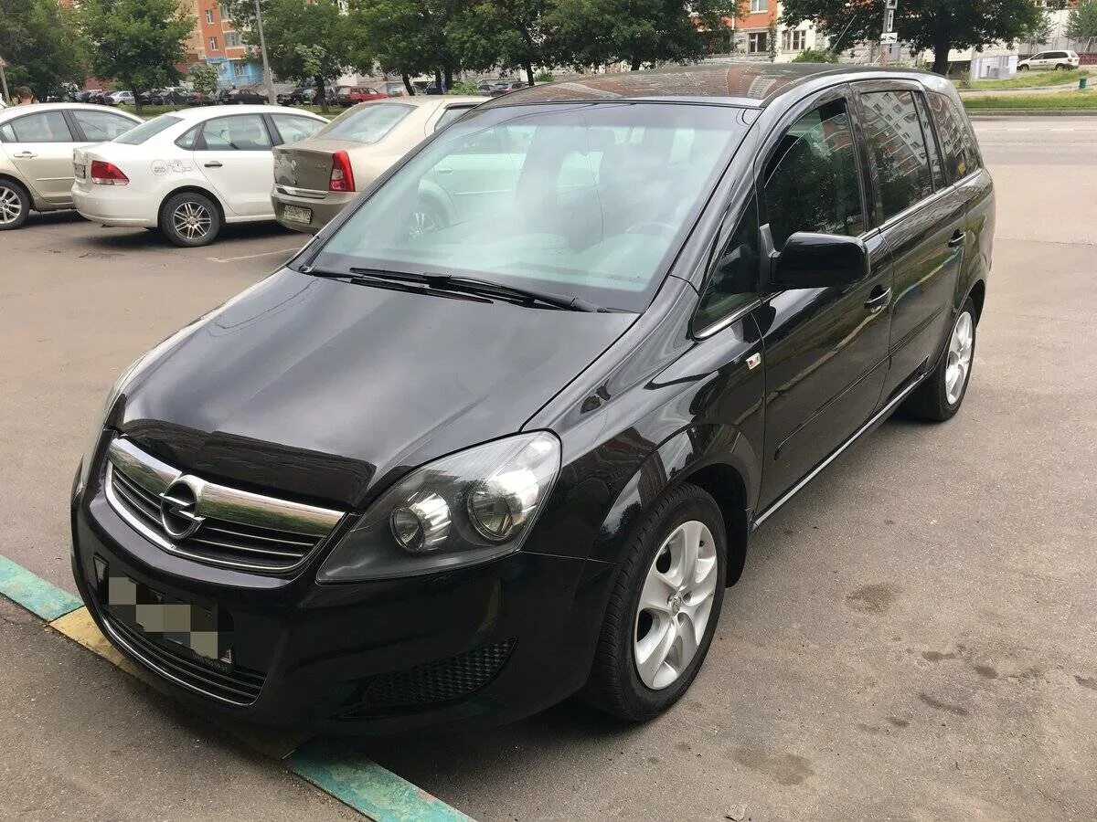 Опель зафира б 2008 года. Opel Zafira 1.8 МТ, 2012 тюнинг серый. В чем разница Зафира б 2008г.